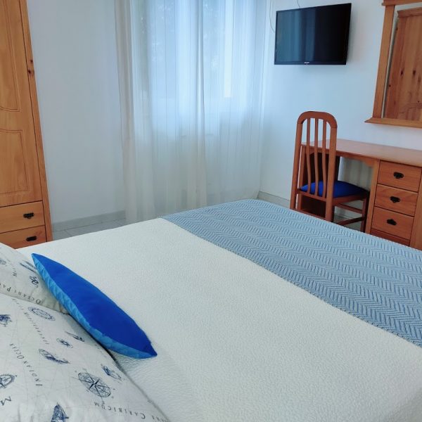 Dormitorio_Hotel_apartamento_jardin_Rodeiramar